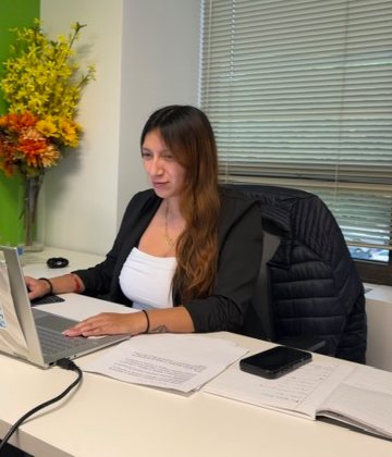Paulina Guevara, Tax Assistant, at her desk at Tax Delivery